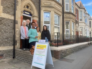 Photo of some of the Mack 61 group outside the building